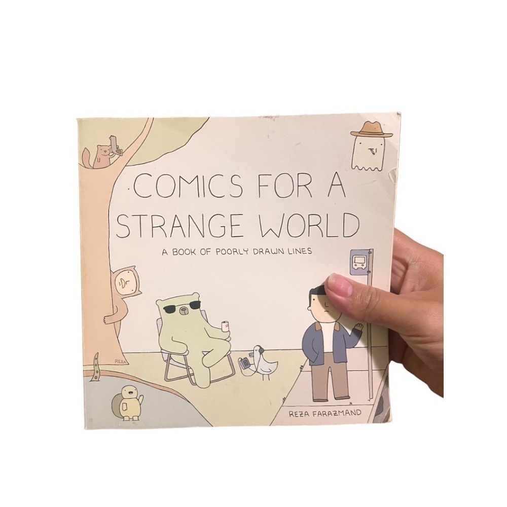 comic/funny comics for a strange world paperback Reza Farazmand